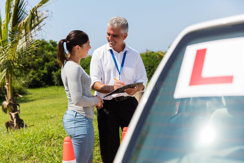 Female learner driver instructor royalty free stock images