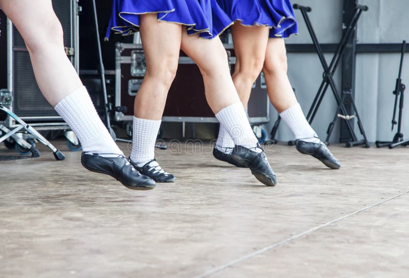 Female legs of three irish dancers