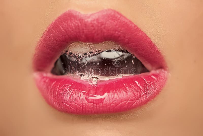 Female lips close-up. Female mouth with bubble