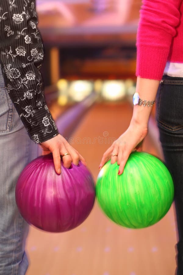 Female and Male Hands Holding Balls in Bowling C Stock Photo Image of