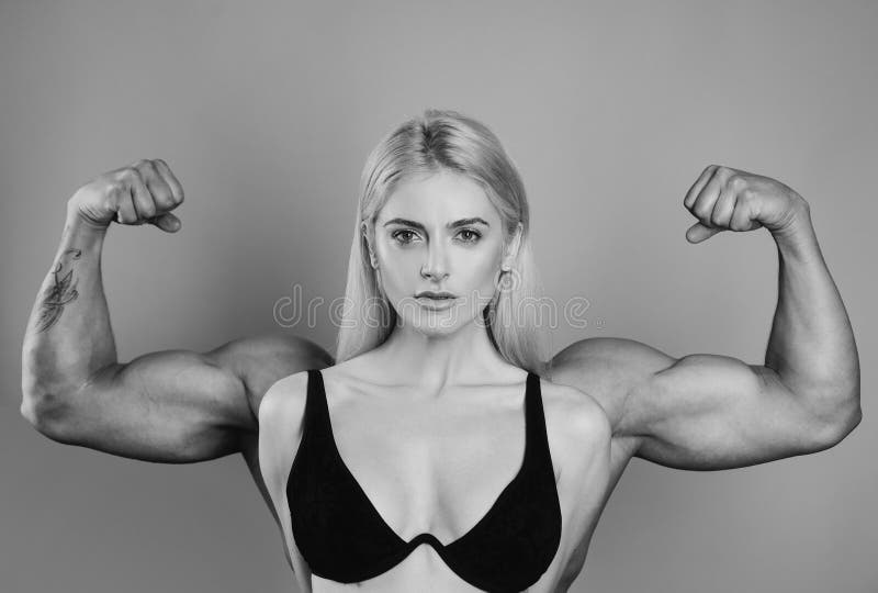 Girl Shows Muscles Her Arms Stock Photos - Free & Royalty-Free