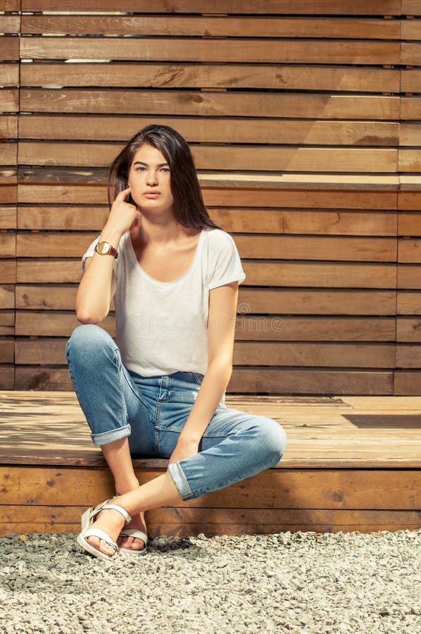 Photo of Women In Denim Shirt and Jeans Posing · Free Stock Photo
