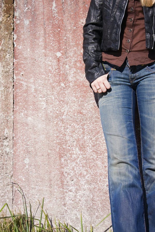 Female model standing at the wall