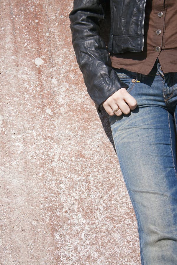 Female model standing at the wall