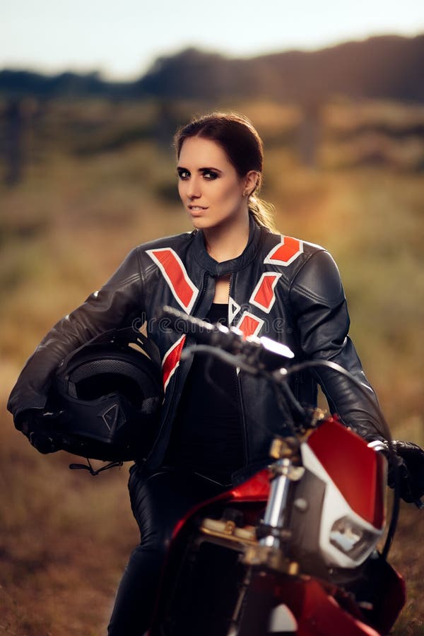 Female Motocross Racer Next To Her Motorcycle Stock Photo - Image of ...