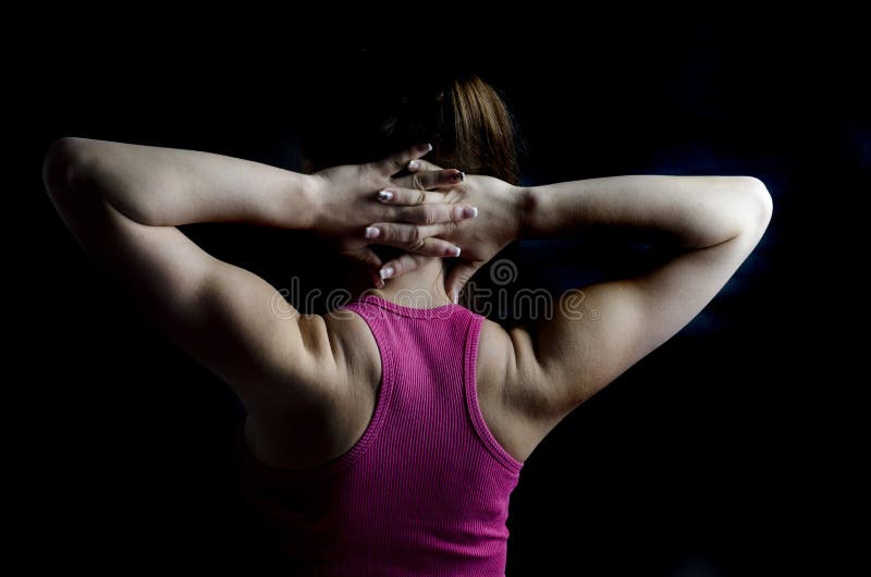 Strong fitness woman showing back biceps muscles - Stock Image - Everypixel