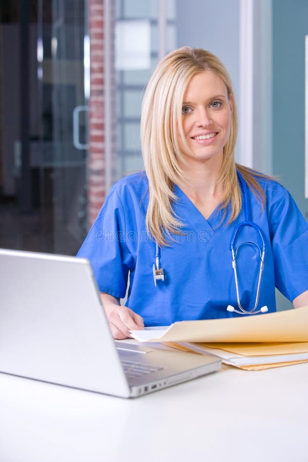 Female Nurse In A Modern Office Stock Image Image of head, hair 10148347