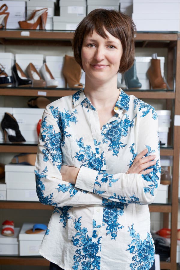 Female Owner Of Shoe Store royalty free stock images Female Owner Of Shoe Store royalty free stock images