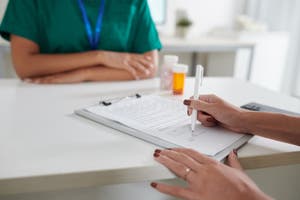 Female Patient Filling Medical Form Stock Photo Image Of Women Female Patient Filling Medical Form Stock Photo Image Of Women