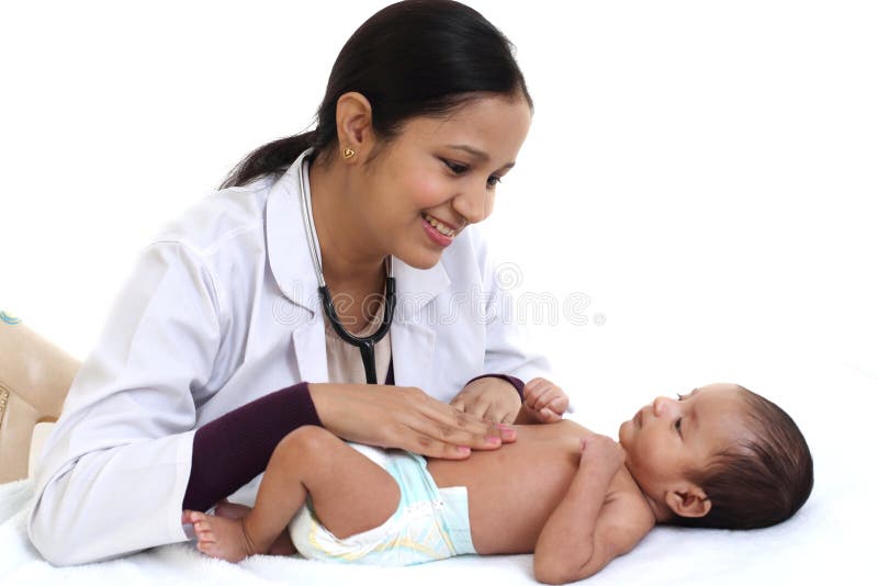 Female pediatrician examine newborn baby stock photo Female pediatrician examine newborn baby stock photo