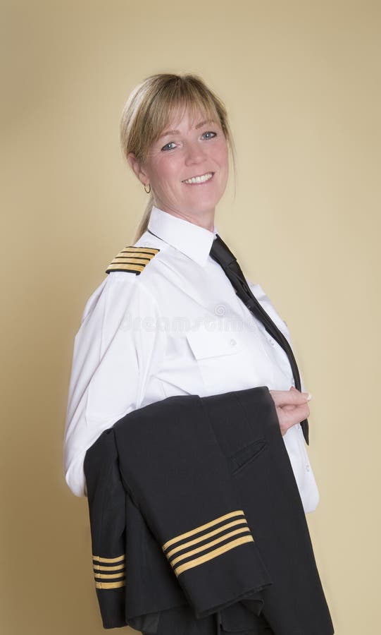 Female pilot in uniform stock image. Image of four, high 51504169