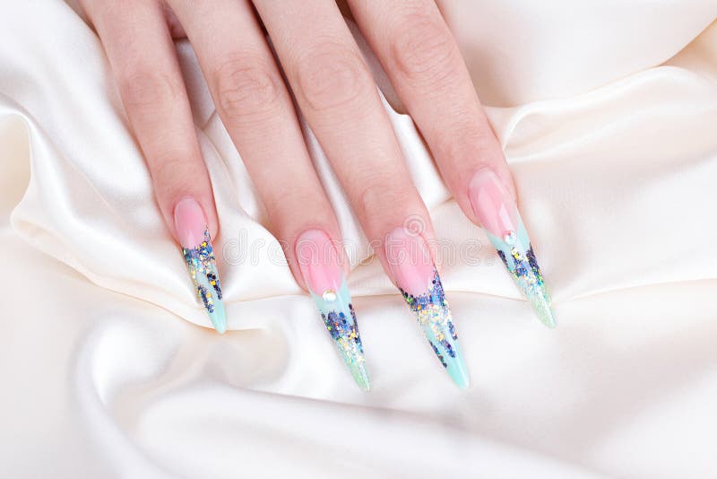 Female polished nails royalty free stock image