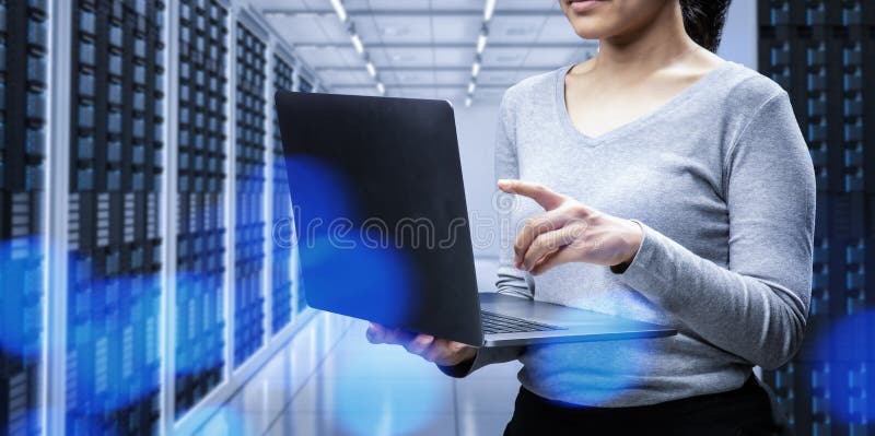 Female programmer in server room royalty free stock photo