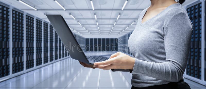 Female programmer in server room stock photos