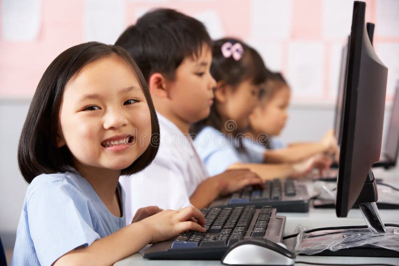 Female Pupil Using Keyboard During Computer Class Stock ...