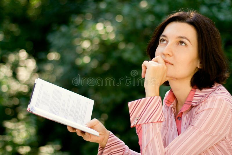 Female reading in park