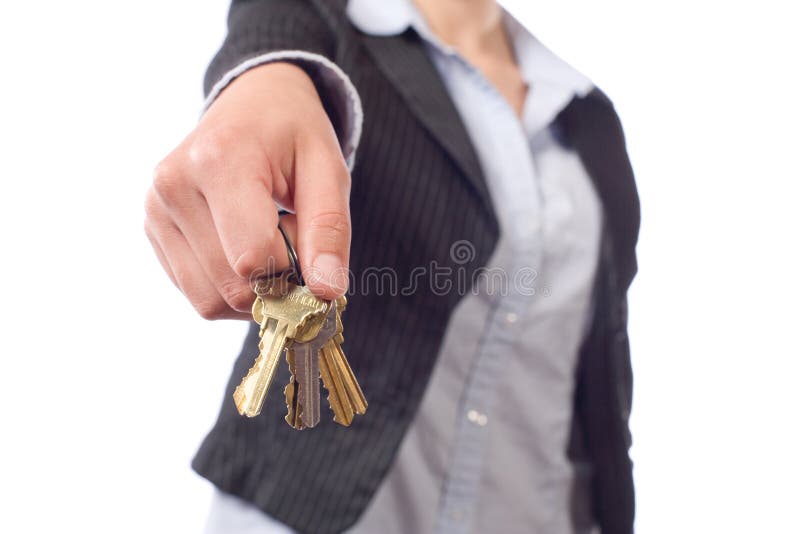 Female real estate agent keys