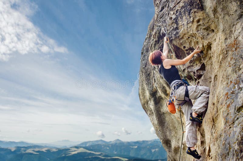 Female Rock Climber on Steep Overhanging Rock Cliff Stock Photo - Image ...