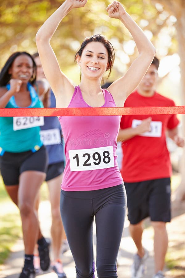 Female Runner Winning Marathon Stock Image Image of happy, athlete