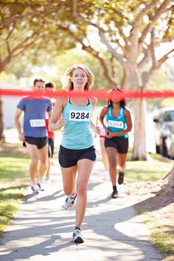 Female Runner Winning Marathon Stock Image Image of club, finishing