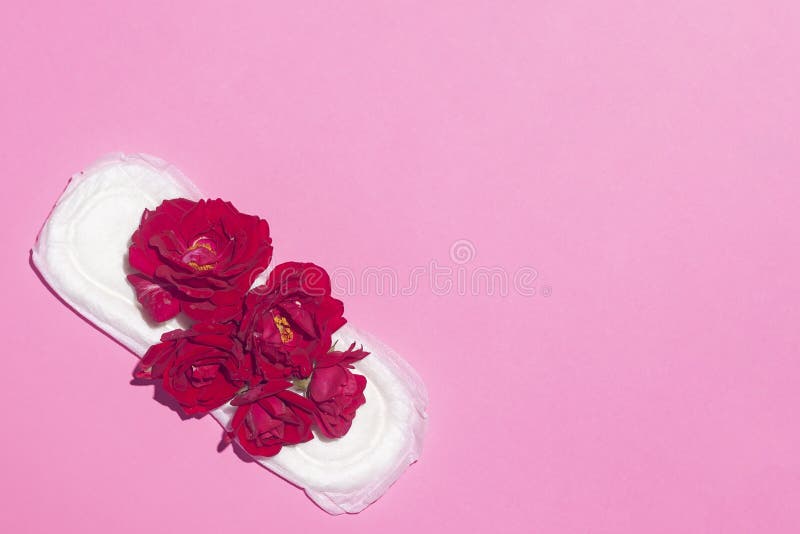 Female`s hygiene products on pink background. Concept of critical days, menstrual cycle, period days, PMS stock photo Female`s hygiene products on pink background. Concept of critical days, menstrual cycle, period days, PMS stock photo