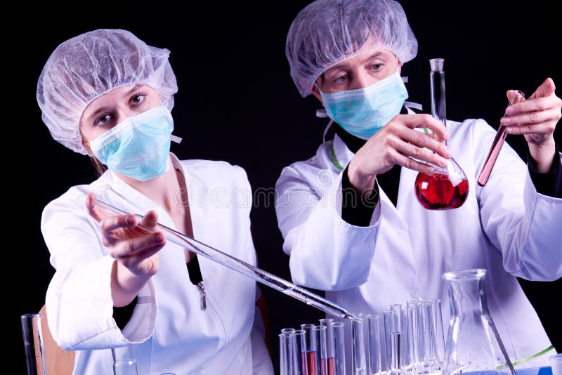 Female Scientists experimenting royalty free stock photo