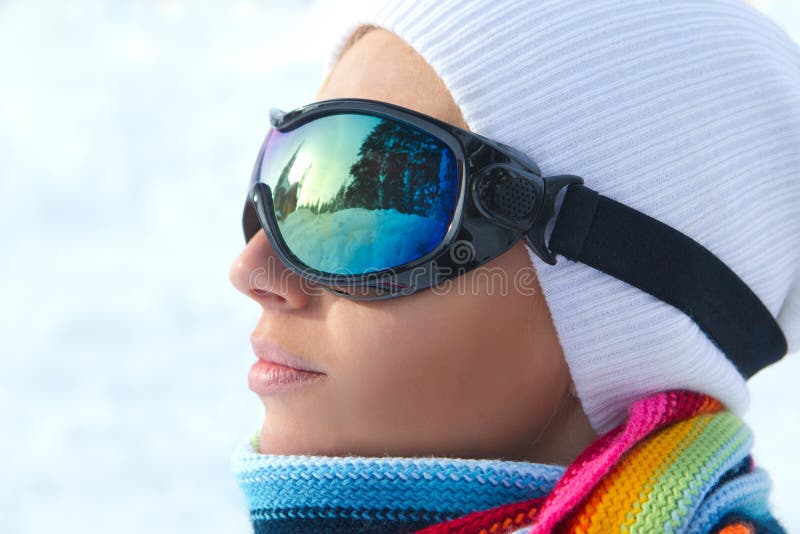 Female skier wearing ski glasses