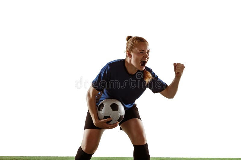 Young female soccer or football player with long hair celebrating goal, winning with expressive emotions on white studio background. Concept of healthy lifestyle, professional sport, motion, movement. Young female soccer or football player with long hair celebrating goal, winning with expressive emotions on white studio background. Concept of healthy lifestyle, professional sport, motion, movement.