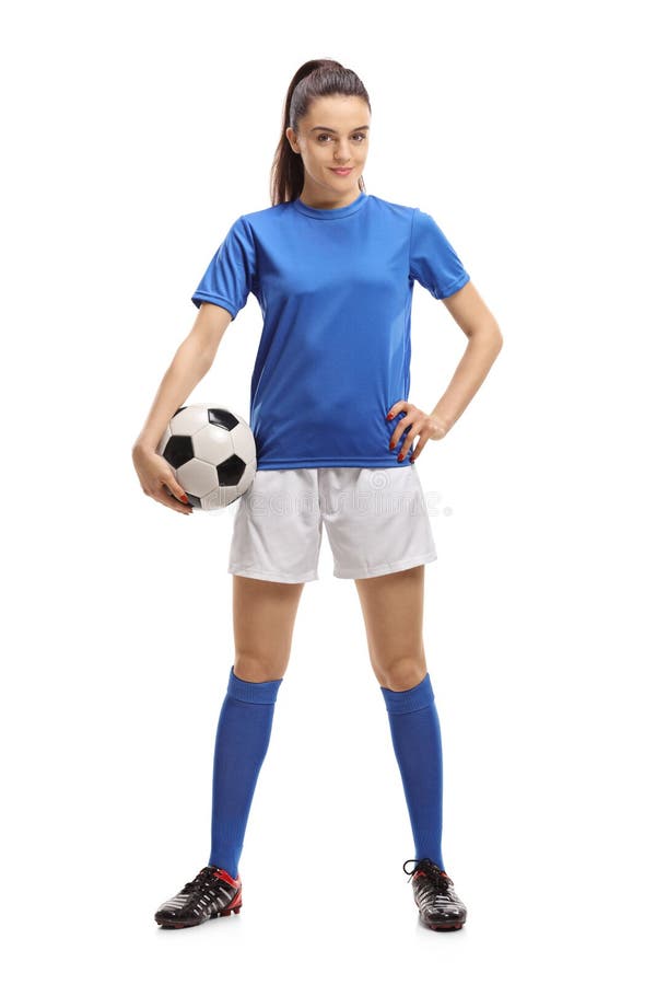 Full length portrait of a female soccer player with a football isolated on white background