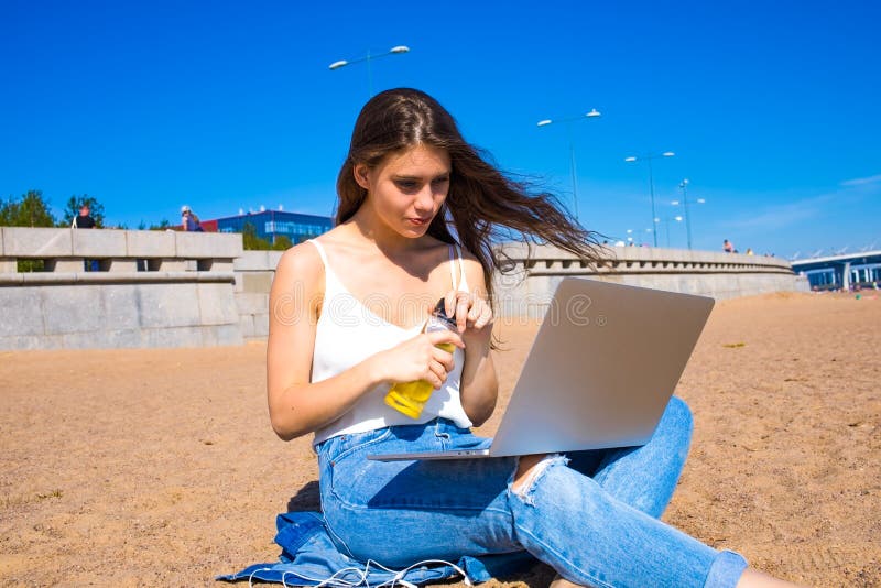 Female student having online education via notebook stock photo Female student having online education via notebook stock photo