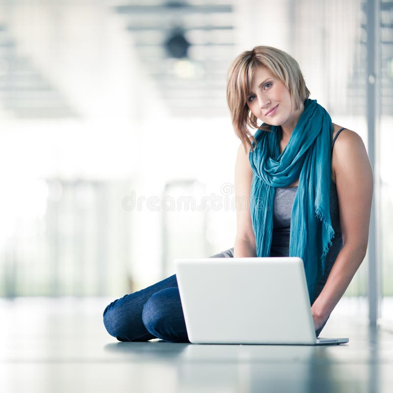 female student with a laptop