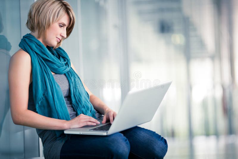 Female student with a laptop