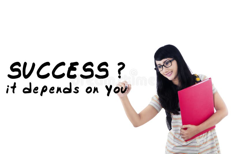 Female student writes motivation word 3 royalty free stock photos