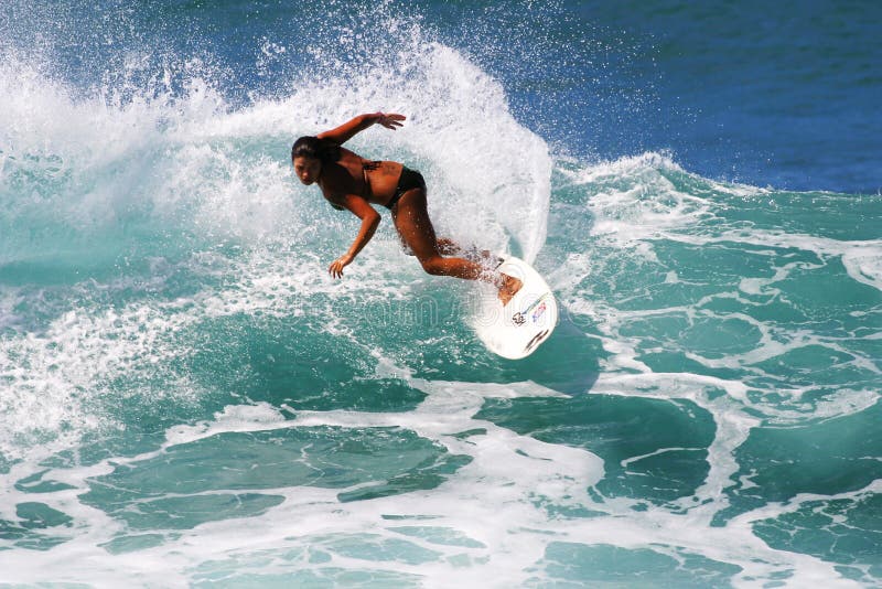 Female Surfer Lani Hunter Surfing in Hawaii stock images Female Surfer Lani Hunter Surfing in Hawaii stock images