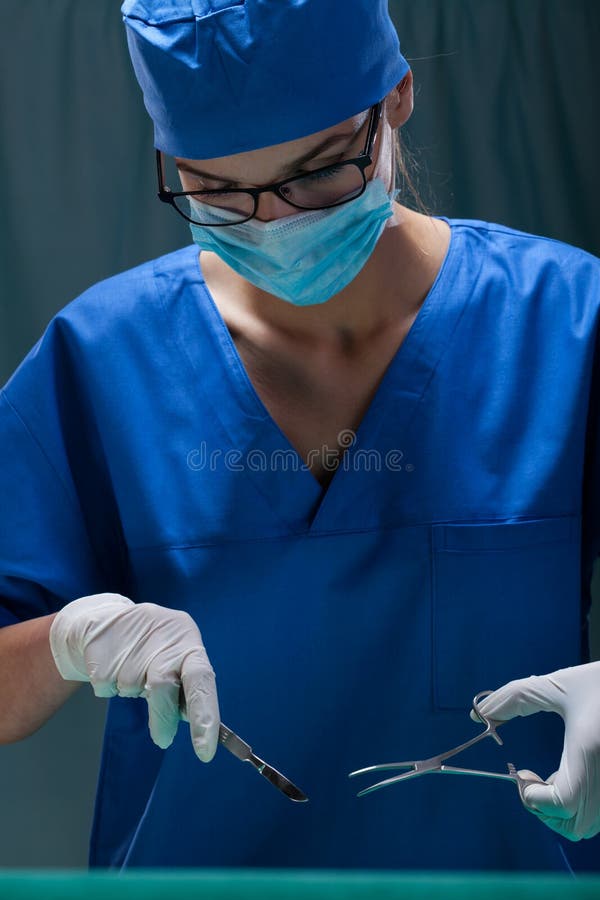 Female surgeon at the work stock photo. Image of concentration 45068024