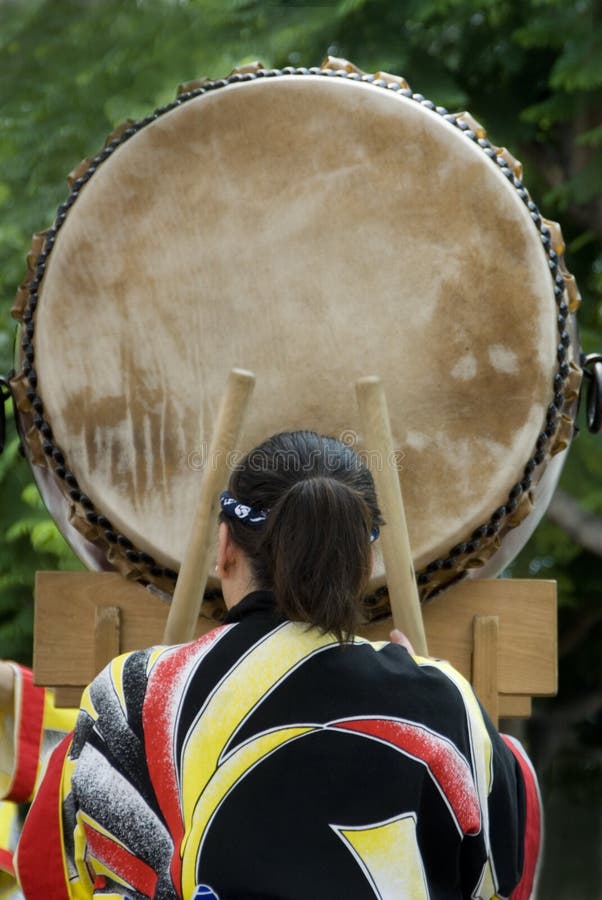 Taiko drummer hits his beats during a taiko festival. Taiko drummer hits his beats during a taiko festival.