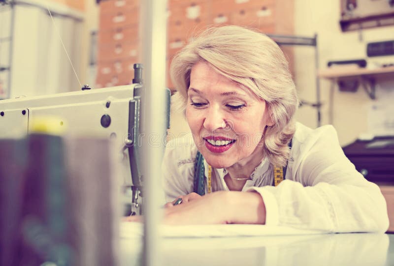 Female Tailor Working on Sewing Machine Stock Photo Image of casual