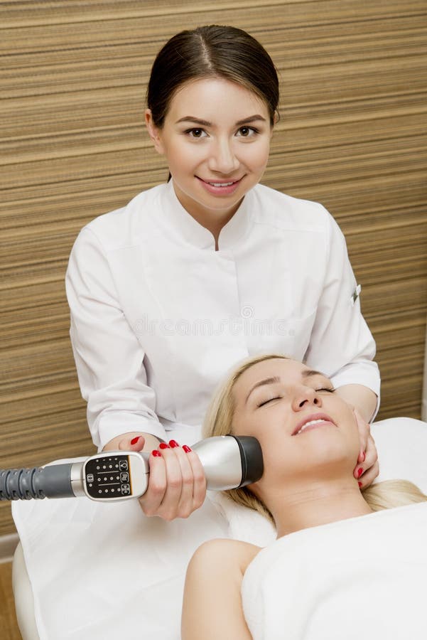 Female Taking a Facial Massage Stock Photo Image of beautiful