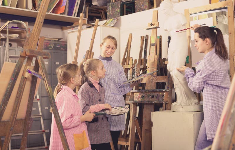 Female Teacher Explaining Painting Techniques Stock Image Image of