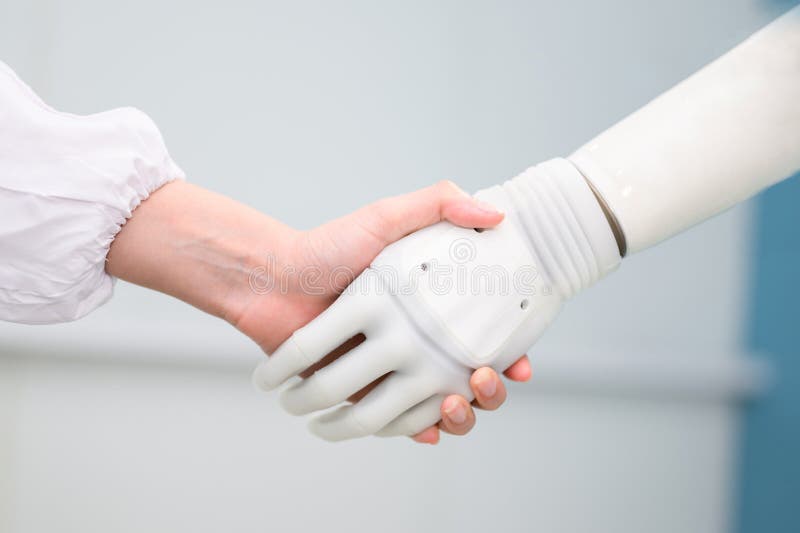 Female technician checking and controlling artificial prosthetic hand stock photo