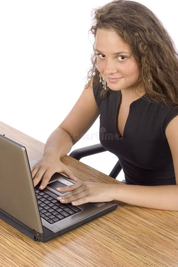 Female teenager at the laptop royalty free stock photo
