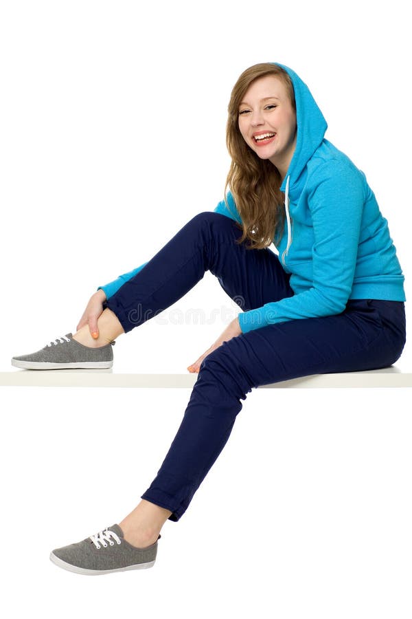 Female teenager wearing hooded top