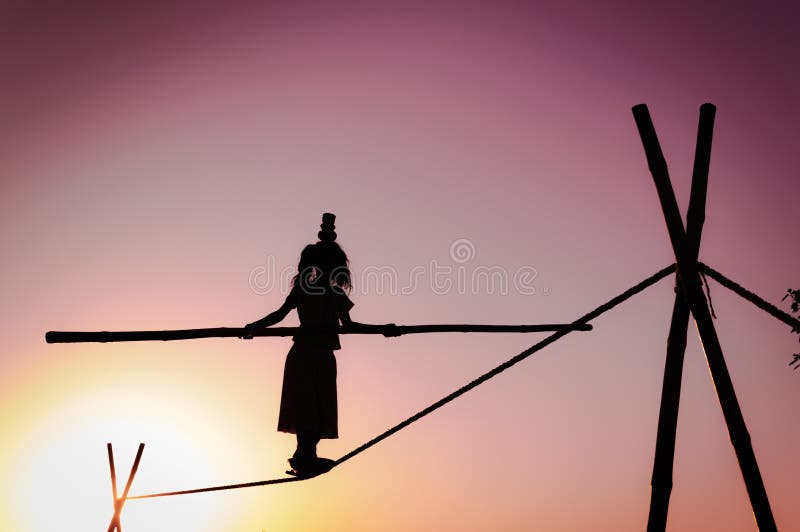 Female tight rope walker in India