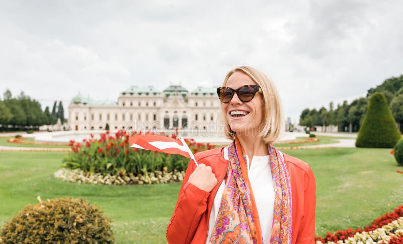 Female traveler on the background of Belvedere Palace complex of the 18th century in Vienna, Austria. stock photos Female traveler on the background of Belvedere Palace complex of the 18th century in Vienna, Austria. stock photos