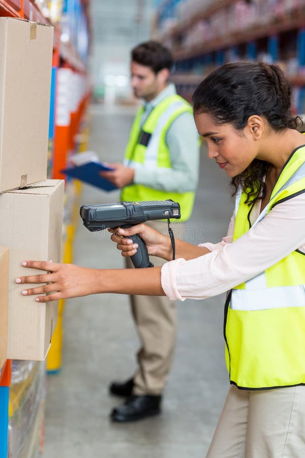 Female Warehouse Worker Scanning Box Stock Photo Image of caucasian
