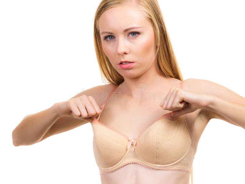 Young Woman Small Boobs Wearing Too Big Bra Cups. Female Breast