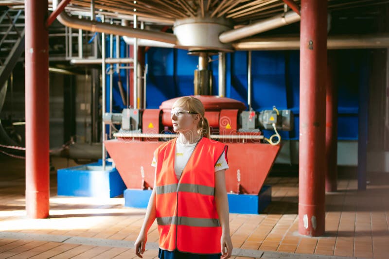Female worker on beer factory. portrait woman in robe, standing on background line Food production, Inspection management control stock images Female worker on beer factory. portrait woman in robe, standing on background line Food production, Inspection management control stock images