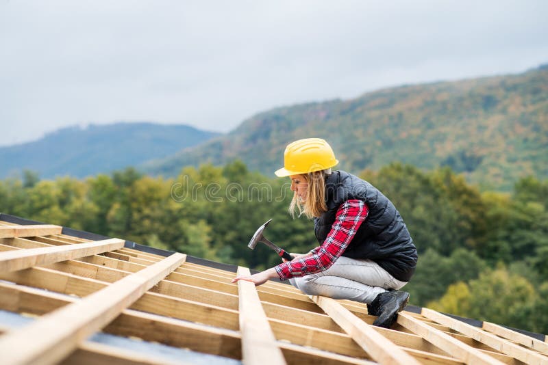 Young woman worker on the construction site. royalty free stock image Young woman worker on the construction site. royalty free stock image