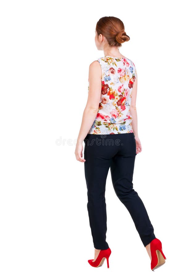 Femeie de afaceri cu capete roșii în mișcare. royalty free stock photography