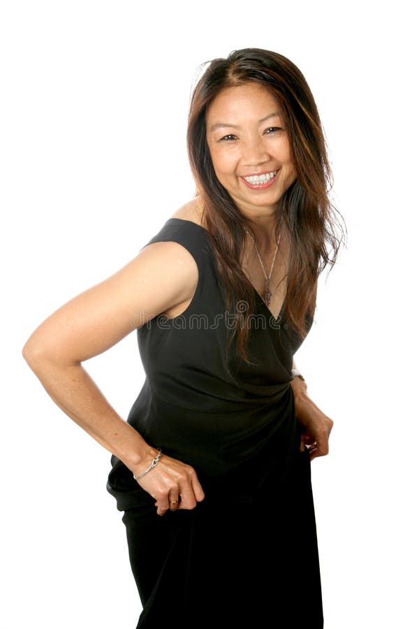 Femelle thaïe, retenant la jupe photo libre de droits